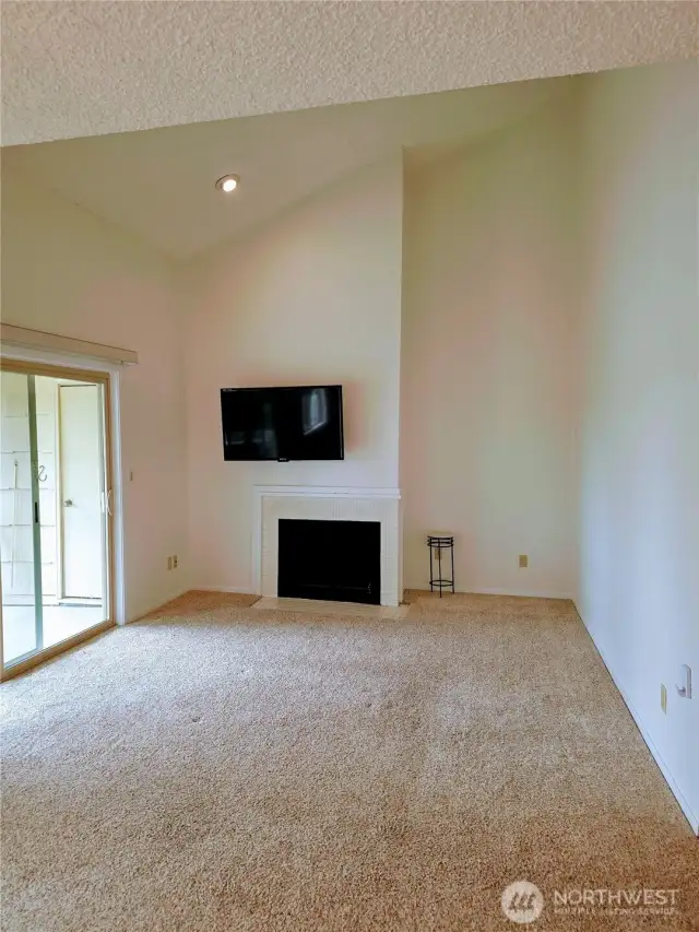 Main living space. High ceilings and frewshly painted!