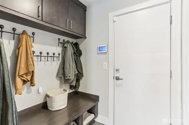 Coat rack & storage next to garage entry