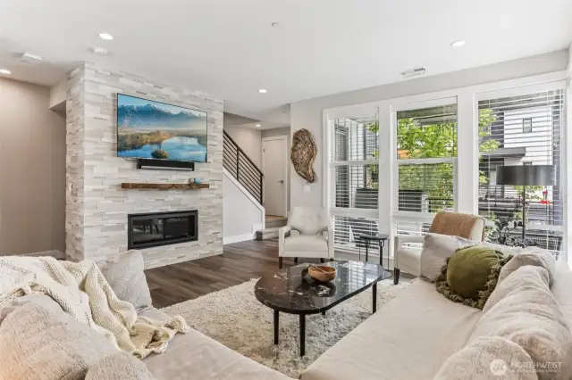 Great room showing fireplace and covered deck