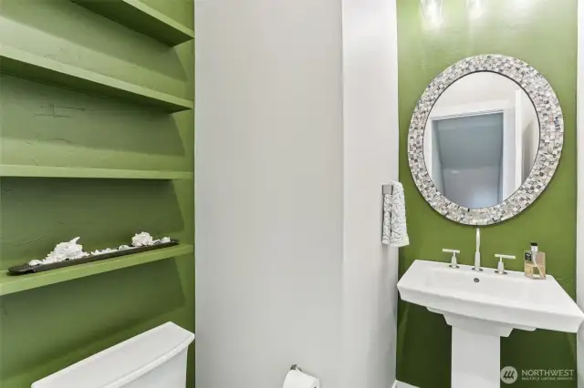 Main floor powder room at the top of the first set of stairs