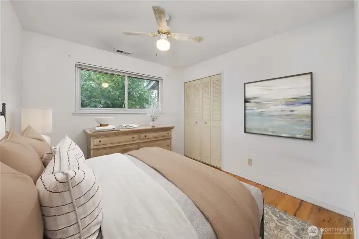 Virtually staged Bedroom 1.