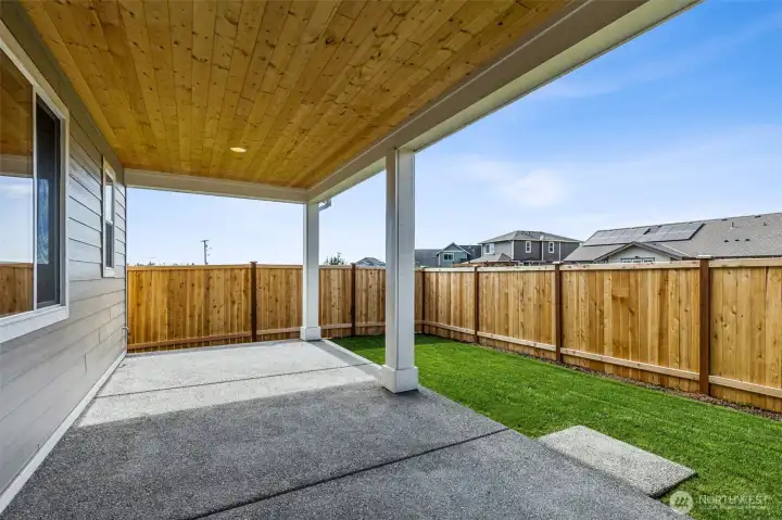 Covered Patio accessed through sunroom.