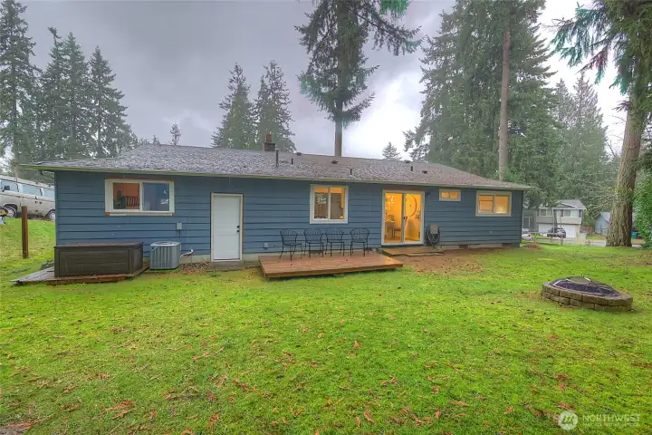 View of the back yard, great entertaining space with fire pit!