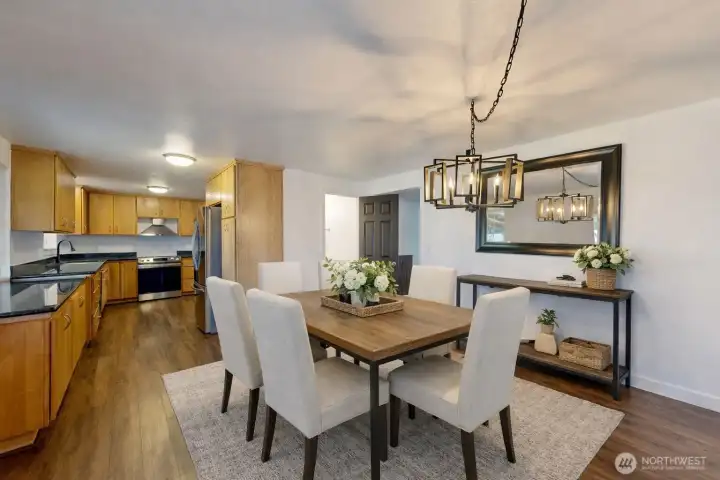 Open dining area. The photo is virtually staged.