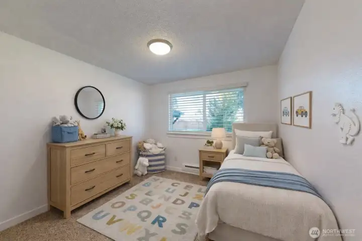 Bedroom 3. The photo is virtually staged.