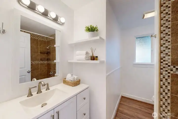 Bright hall bathroom. The photo is virtually staged.