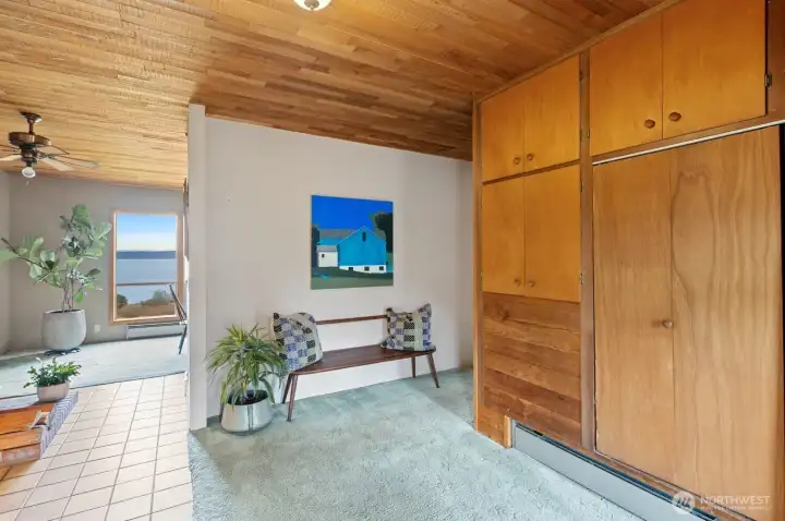 The entry again, with closets and storage cabinets.