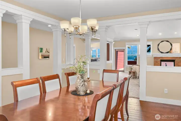 Formal dining room with living room beyond