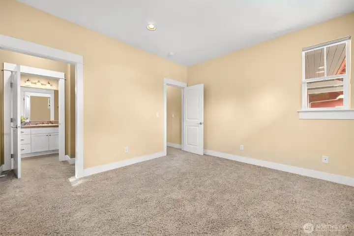 This bedroom has it's own walk-in closet and full bath