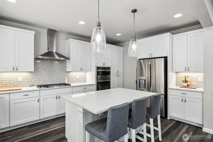 Large island & tiled backsplash