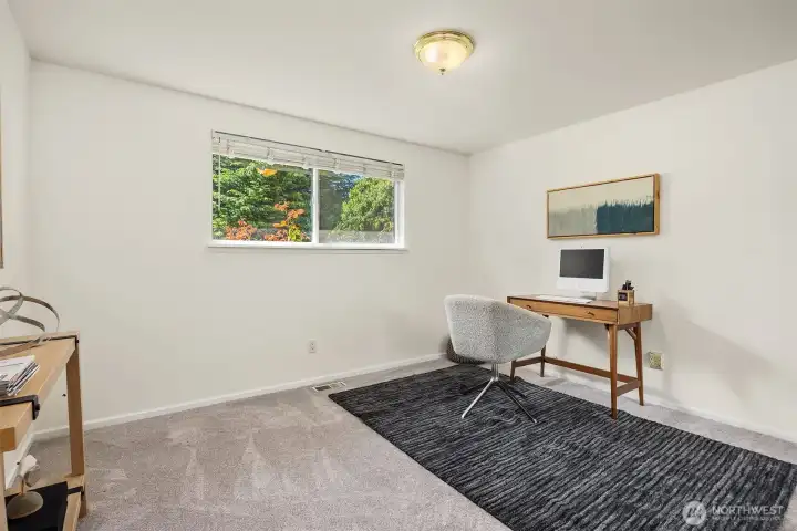 Third bedroom currently staged as an office.