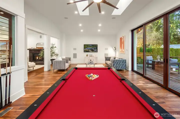 Entertainment lounge featuring a large pool table