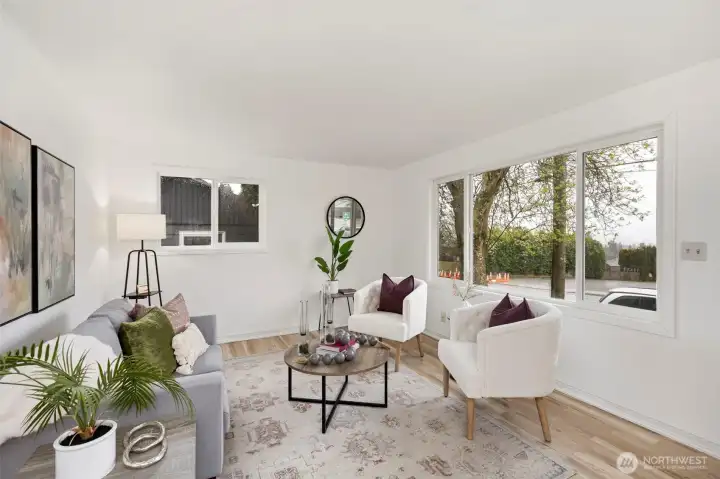 3326 - New flooring, paint & newer windows!