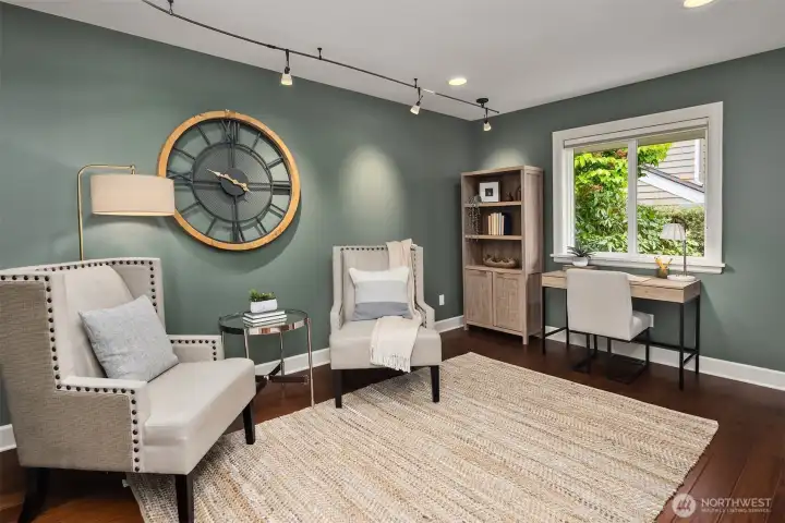 A flexible, light-filled space—equally suited as a private office or an additional bedroom—where thoughtful design and a calm palette create a setting for focus or retreat.