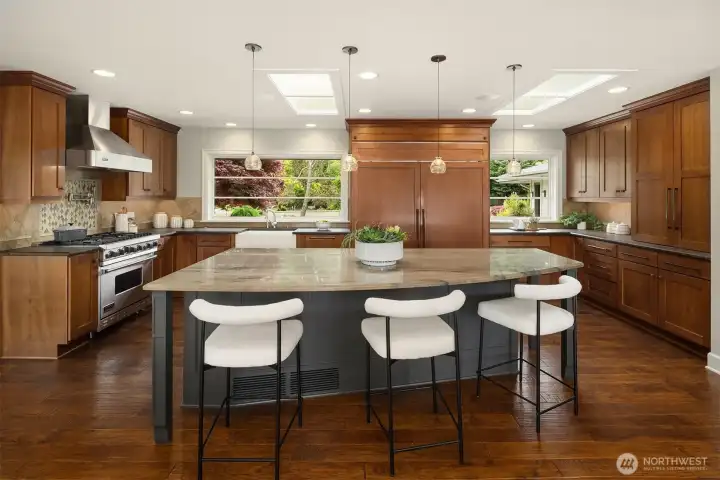 From weeknight dinners to weekend hosting, this kitchen keeps everyone connected—open sightlines, generous prep space, and seamless flow make it the natural heart of the home.