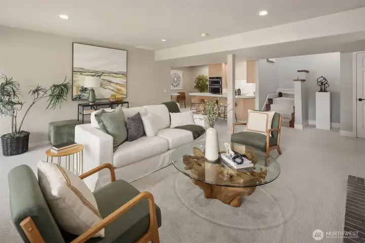 An expansive rec room that flows seamlessly into the secondary kitchen—perfect for hosting, game nights, or relaxed weekends at home.