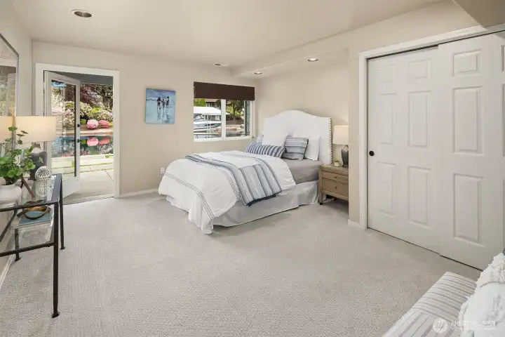 A private lower-level ensuite with direct outdoor access—ideal for guests, extended stays, or multigenerational living with a sense of independence.