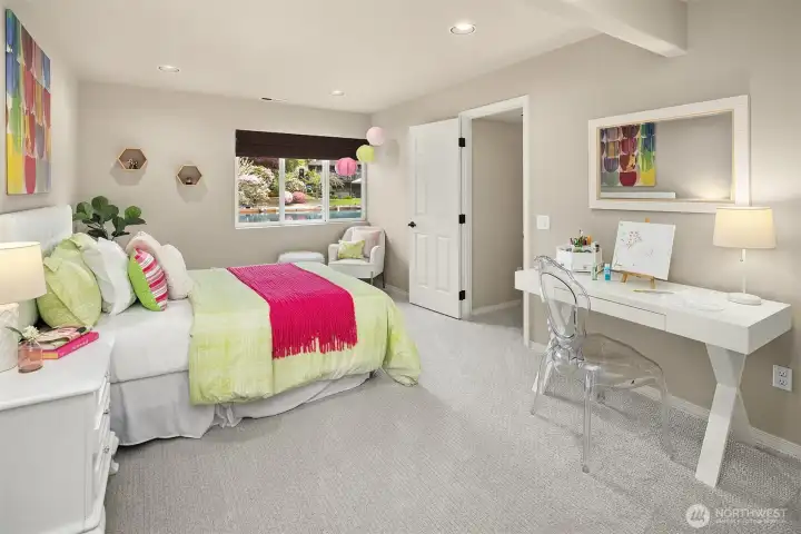 A cheerful and versatile bedroom, offering space for rest, creativity, or study—designed to adapt as needs evolve.