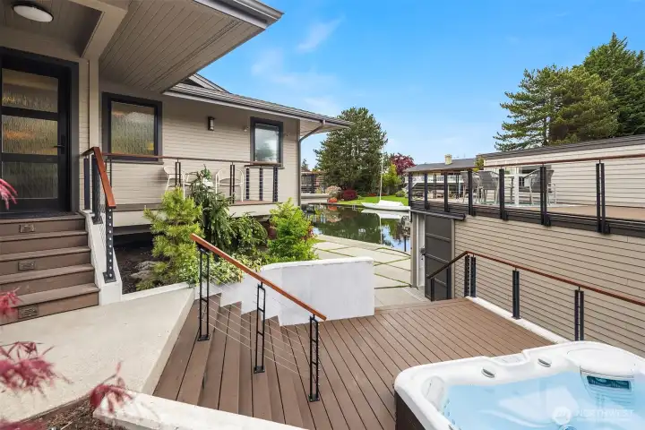 A layered outdoor experience designed for both gathering and retreat. The multi-level, ~1,400 SF floating Trex decking system creates distinct spaces—from sunlit lounging to a quiet soak in the spa—each with its own perspective on the water. It’s effortless, low-maintenance living, built for long summer days and relaxed evenings outdoors.