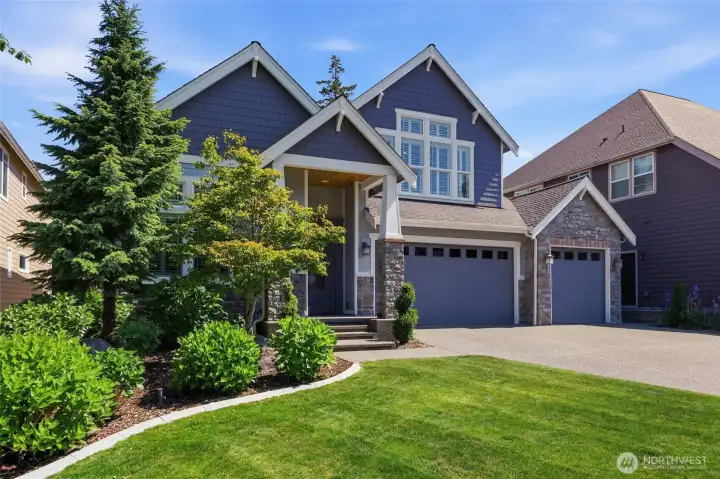 Landscape curbing and mature landscape surrounds the home!
