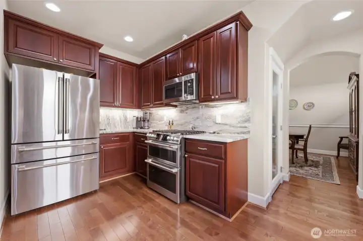 Walk in pantry between kitchen and formal dining