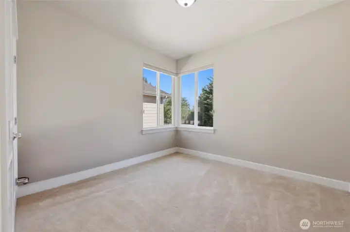 Bedroom 4 with corner windows