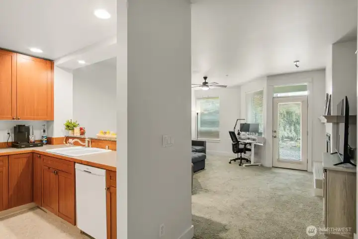Kitchen and living room looking from hallway