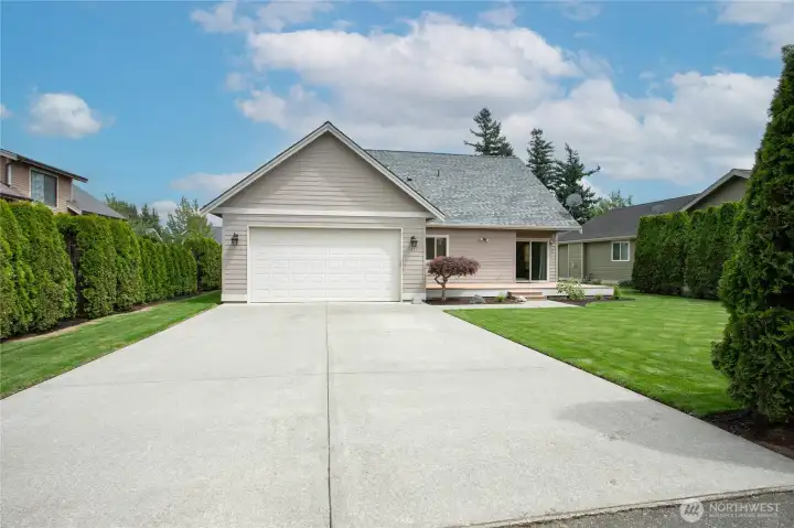 2 car attached garage with extra parking and alley access