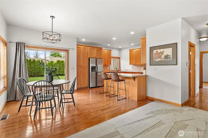 Light and bright spaces, real hardwood floors, beautiful wood cabinetry and wide plank trim throughout.