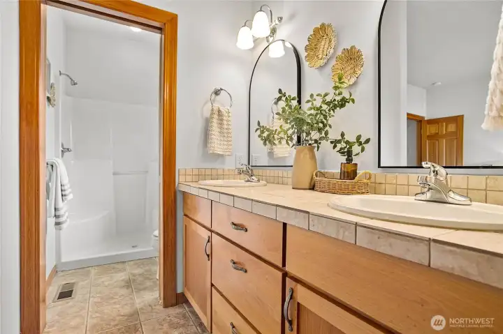 A peaceful, functional ensuite provides comfort and convenience all on one level.