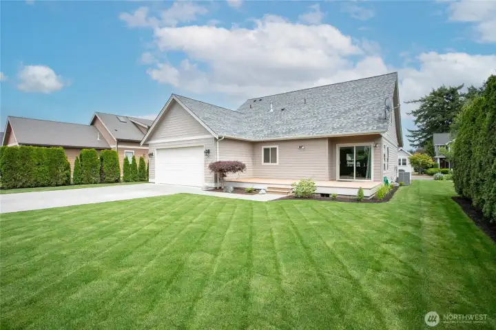 Relax or entertain in the private, beautifully landscaped backyard complete with an irrigation system.