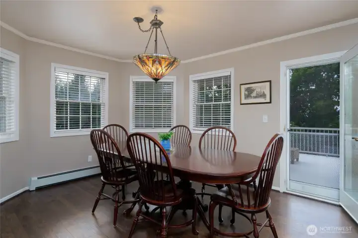 Dining room with door leading out to the large deck. Dining room with door leading out to the large deck.