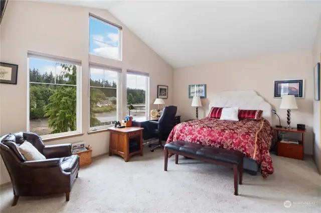 Views abound from this primary bedrooml.