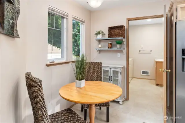 Kitchen area with room for table and chairs.