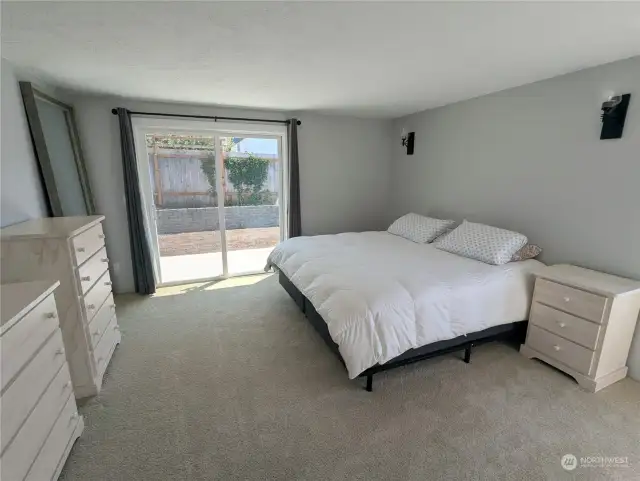 Primary Bedroom with new slider to patio