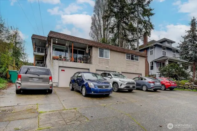 From of the tri- plex. all units are on a second floor and three garages, what we are renting separately.