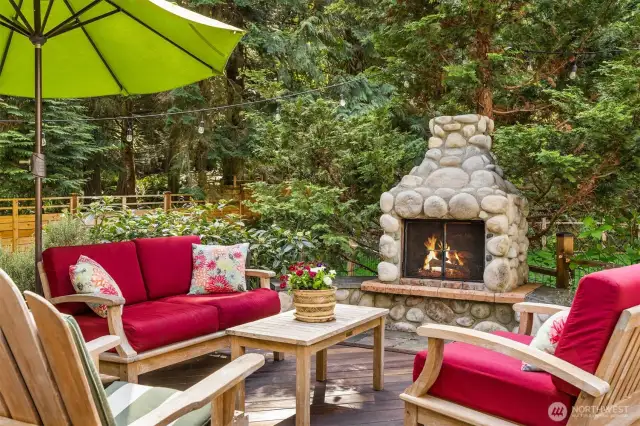 Cozy up outside on cooler seasons with an outdoor fireplace and relaxing privacy.