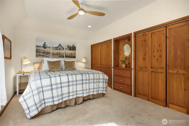 A main floor primary suite is such a bonus. this room is large and comfortable and overlooks the back yard. Built in closets provide plenty of storage.