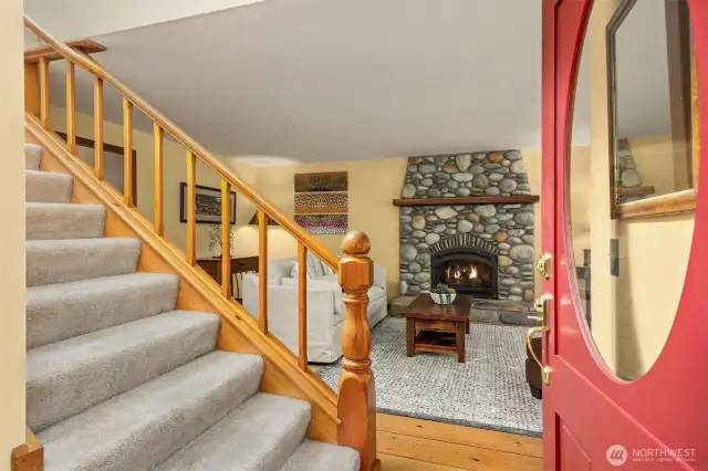 Stairs leading to the 2nd story bedrooms is right off the living area.