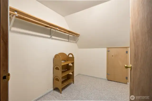 This large storage closet sits off the bonus room above the garage.