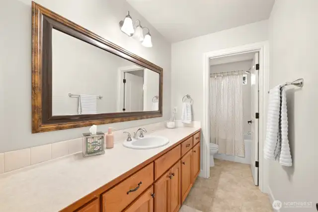 One of three full bathroom upstairs!