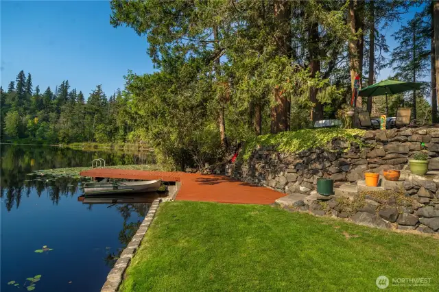 Dock and level grass area for entertaining