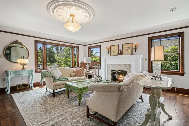 Refinished Wood Burning Fireplace & Beautiful Wood Wrapped Windows