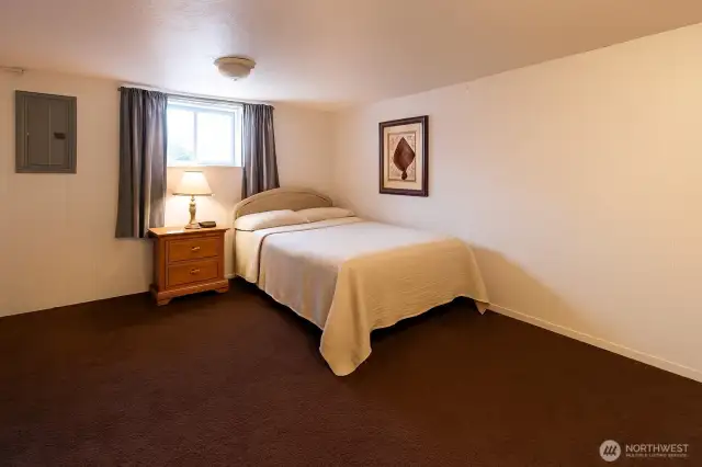Lower level guestroom.  (Enhanced by Copilot)