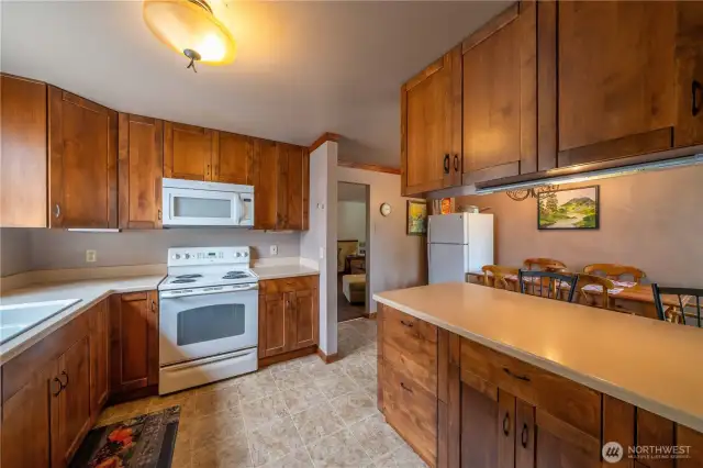 View of the kitchen...and eating area.  There is a breakfast bar too!