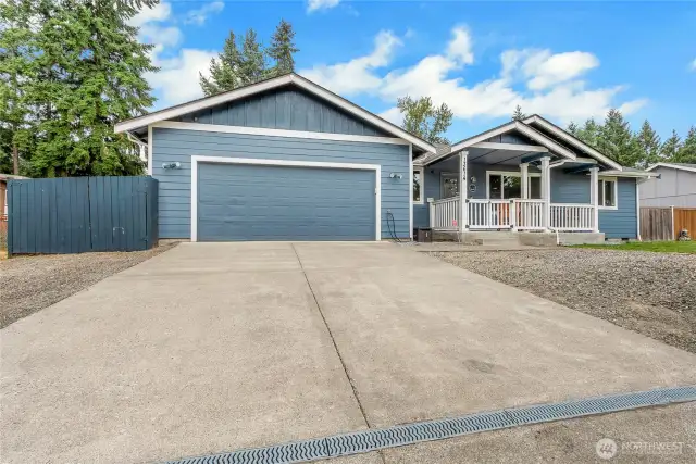Beautiful Rambler With With Extra Parking, Room For 8 Cars Including Garage!