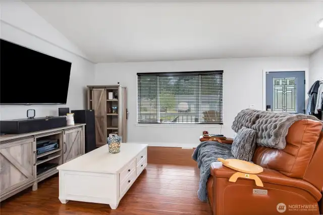 Open Concept Living Area, Lot's of Natural Light and Beautiful Laminate Floors