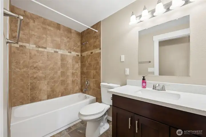 Main bathroom in the hallway.