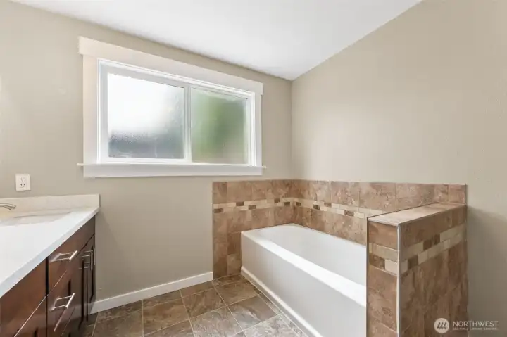 Tub in primary bath.