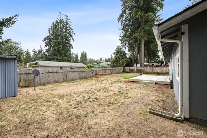 Storage shed (on left) is a perfect spot for all your yard tools. (Old satellite has been removed).